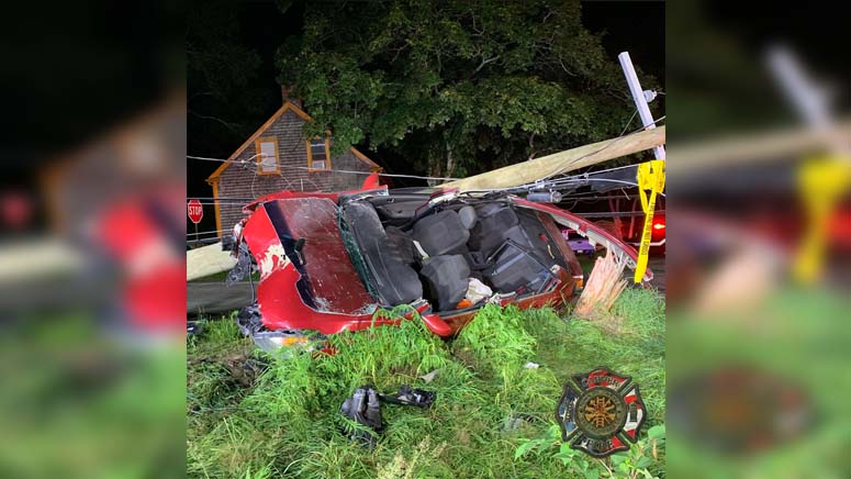 Crews remove driver trapped in car after striking and snapping a ...