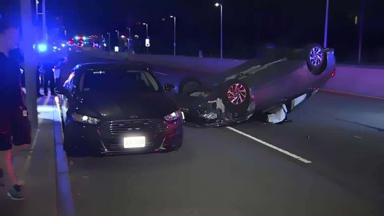 2 people hospitalized after Boston rollover crash damages police ...