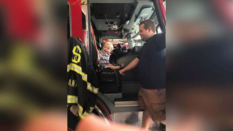 Young boy reunited with hero first responders who saved him from ...