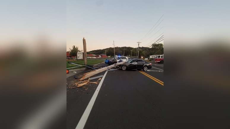 Methuen road closed after car crashes into utility pole, brings down ...