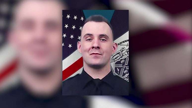 NYPD officer killed by friendly fire is hailed as a hero - Boston News ...