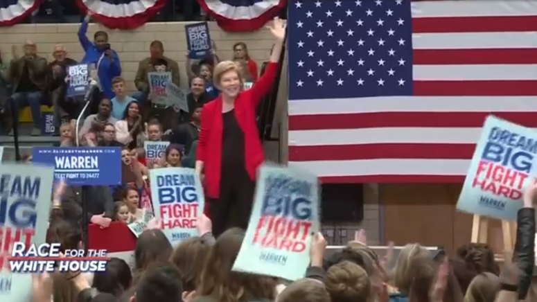 Warren blasts billionaires as Democrats end year campaigning Boston