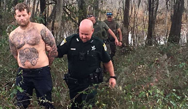 Police: Wanted man who forgot ‘he’s not a fish’ tried to hide in pond ...