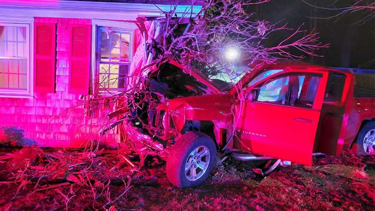 Resident shaken after alleged drunken driver crashes truck into ...