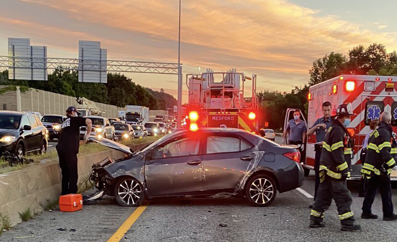 Driver taken to hospital after car rolls over multiple times on I-93 in