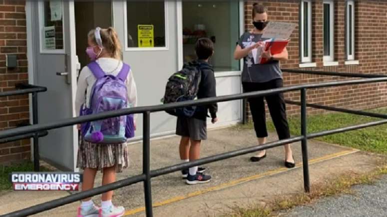 Masked and long absent, many students return to Mass. schools - Boston ...