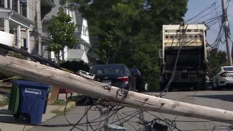 Trash truck rips down power lines in Somerville Boston News Weather