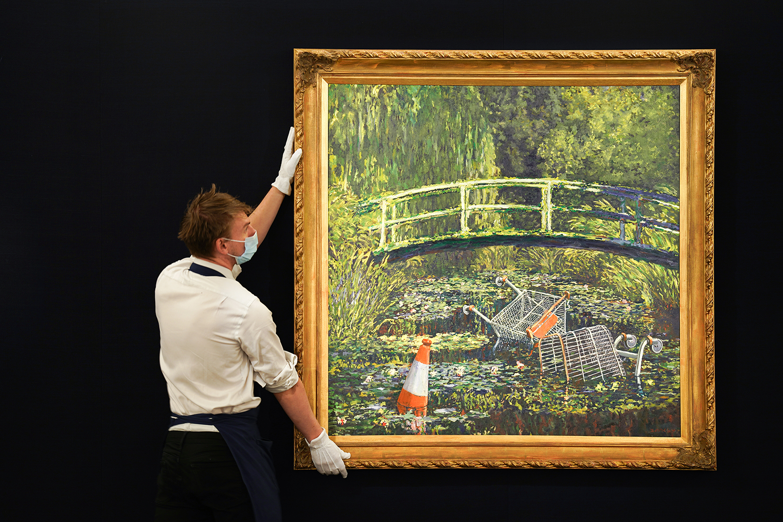 Banksy s show me the monet painting sells for nearly 10 million