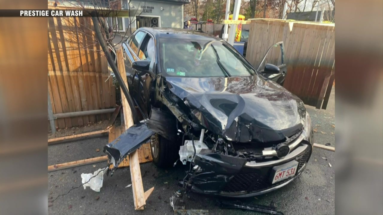 Video shows vehicle slamming into vacuum, fence with customers nearby