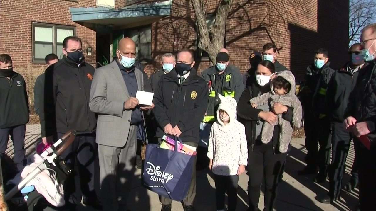 Family reunited with firefighters who rescued them from burning Boston ...