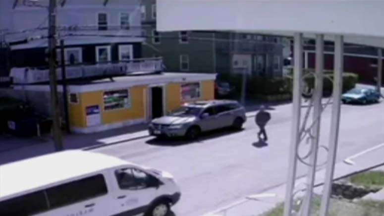 WATCH: New surveillance video shows moment man takes off in stolen car ...