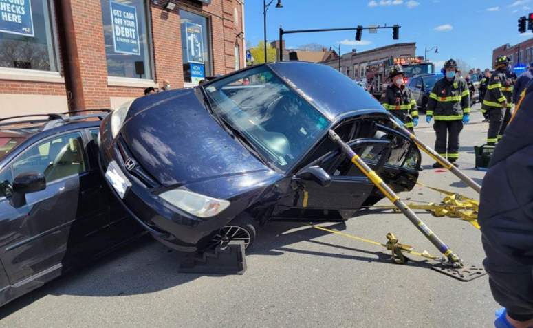 Driver extricated after Medford crash leaves car on top of ...