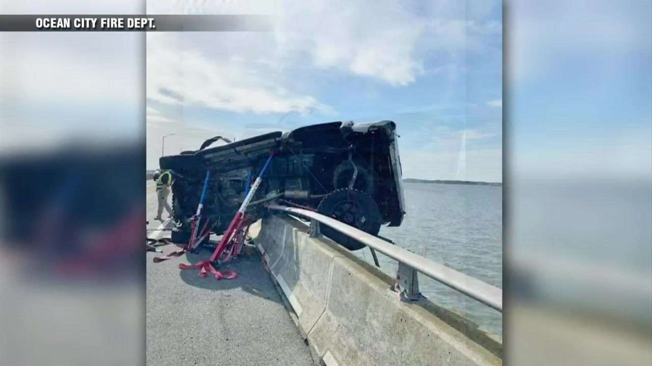 Infant ejected from car and into bay rescued by good Samaritan who ...
