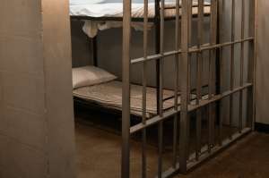 white bed linen on bed