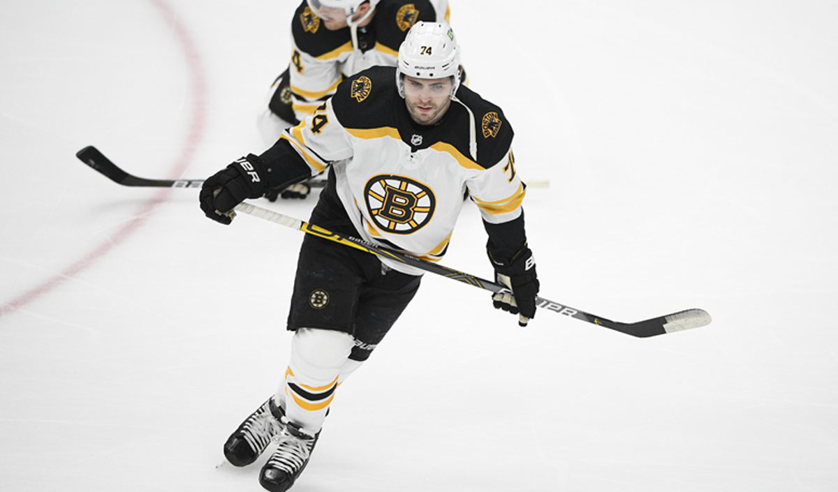 Bruins extend DeBrusk, keep him at deadline despite trade request
