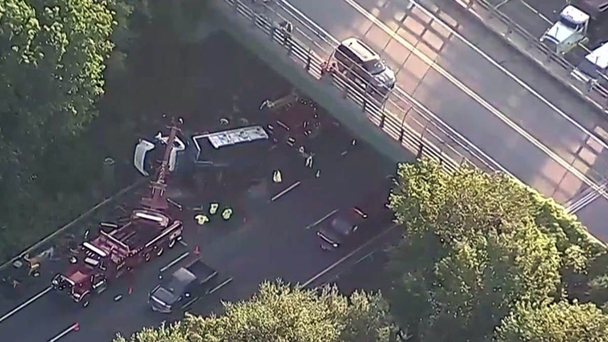 Rollover crash involving dump truck snarls rushhour traffic on I495