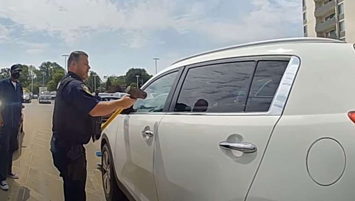 WATCH: Police shatter window to save baby in hot car after mom locks ...