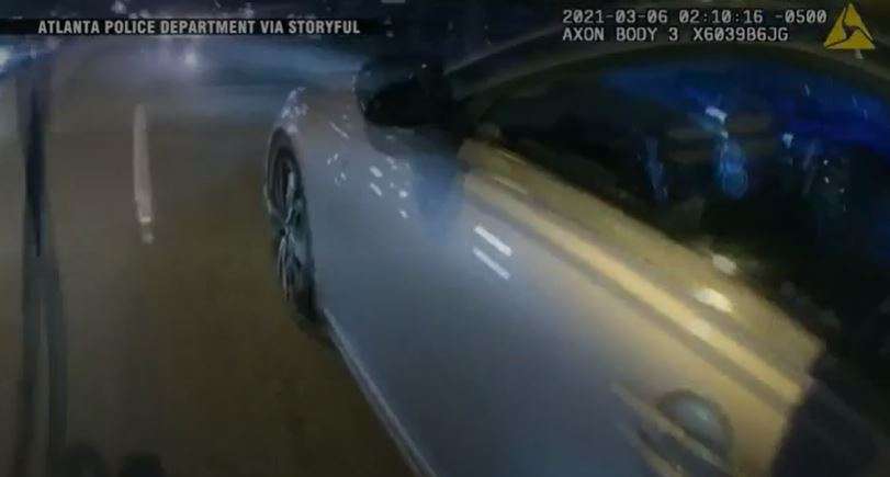 WATCH: Atlanta officers chase down moving car with unconscious man ...