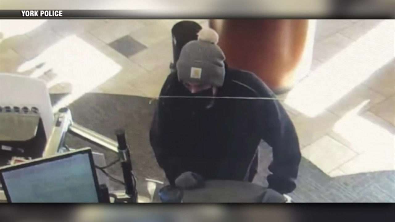 Police: Bank robbery suspect remains on loose after leading officers on ...