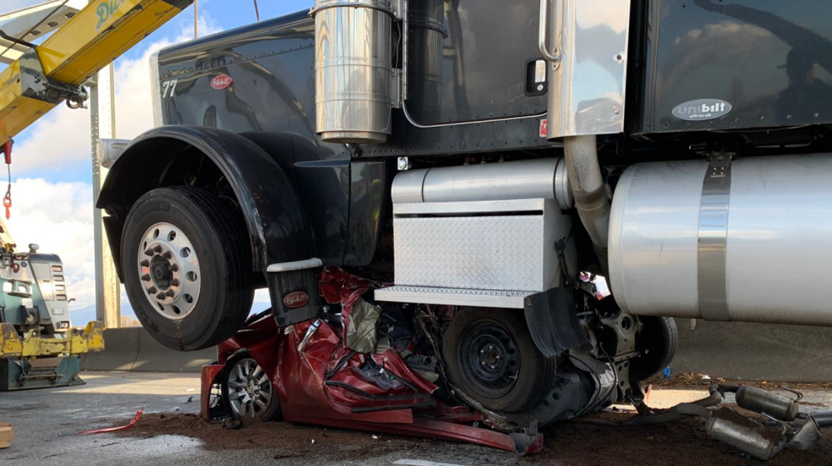 Driver ‘miraculously’ escapes crash with minor injuries after semi