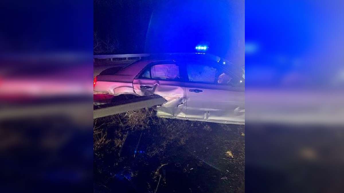 Driver escapes injury after crash sends guard rail through car in ...