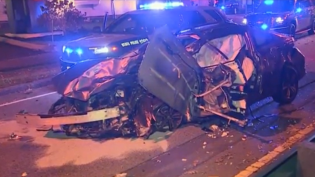 Police Driver who blew through light caused crash in Brighton that