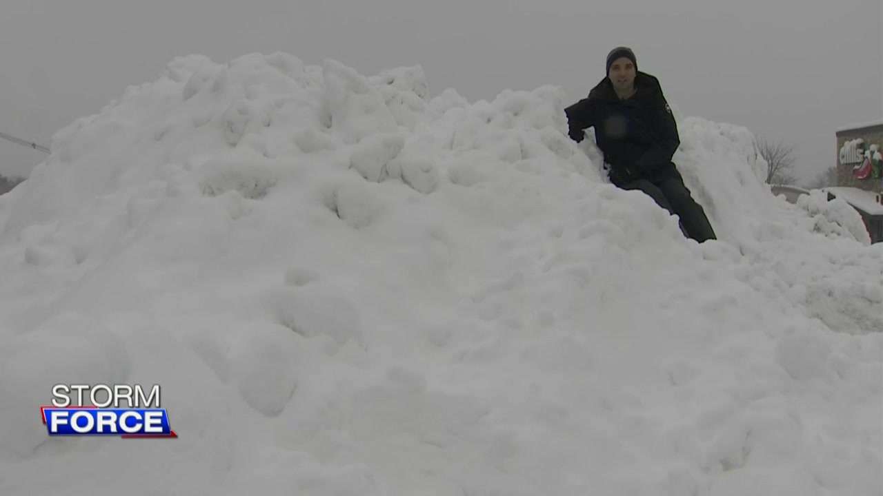 Massive snow piles popping up in Mass. as crews work to clear roadways ...