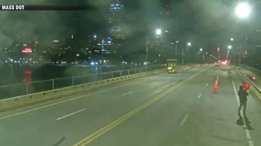 WATCH: Video shows vandals throwing cones off Mass. Ave. bridge