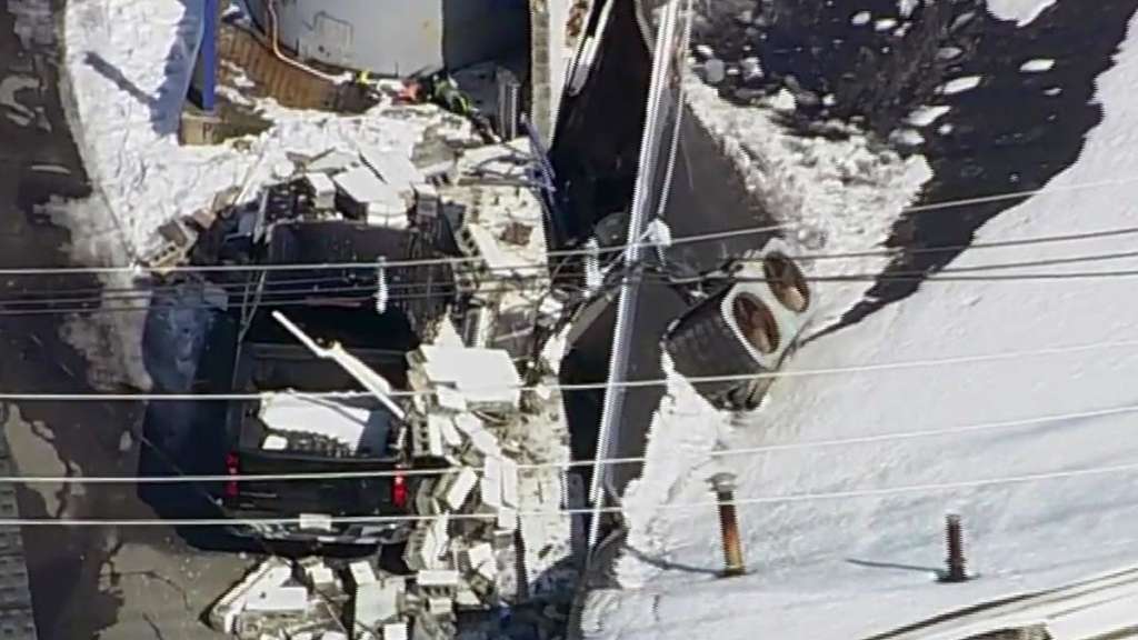 Investigation underway after building collapses in Gloucester Boston