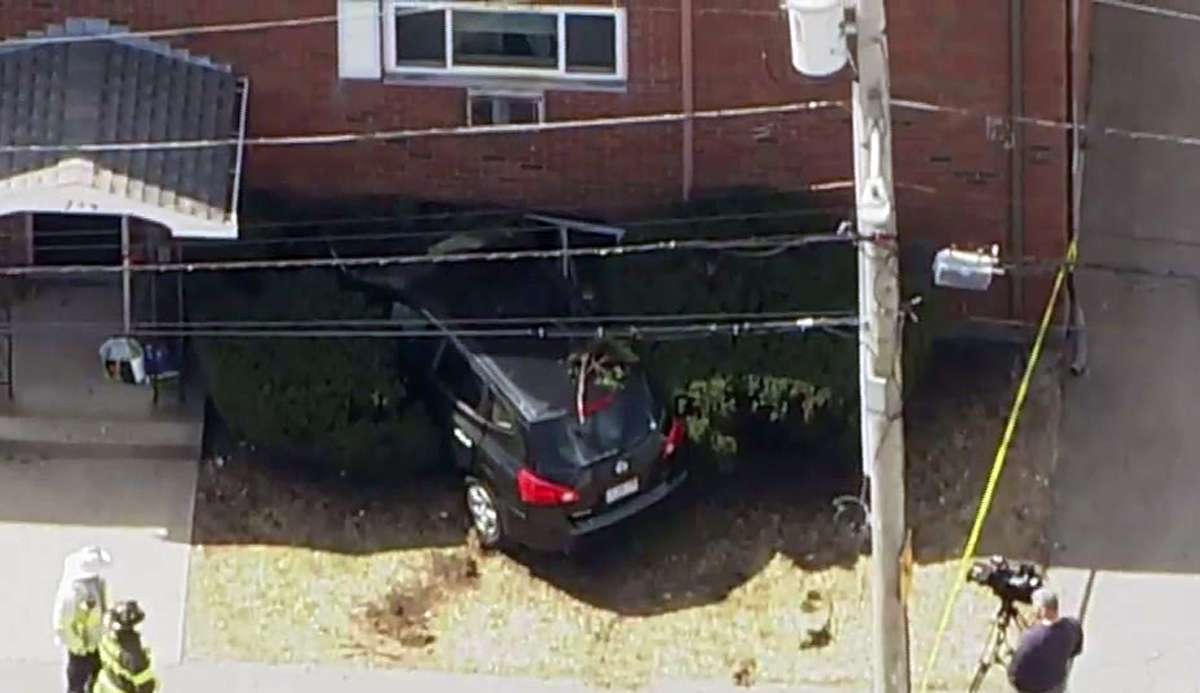 Investigation underway after car crashes into building in Quincy ...