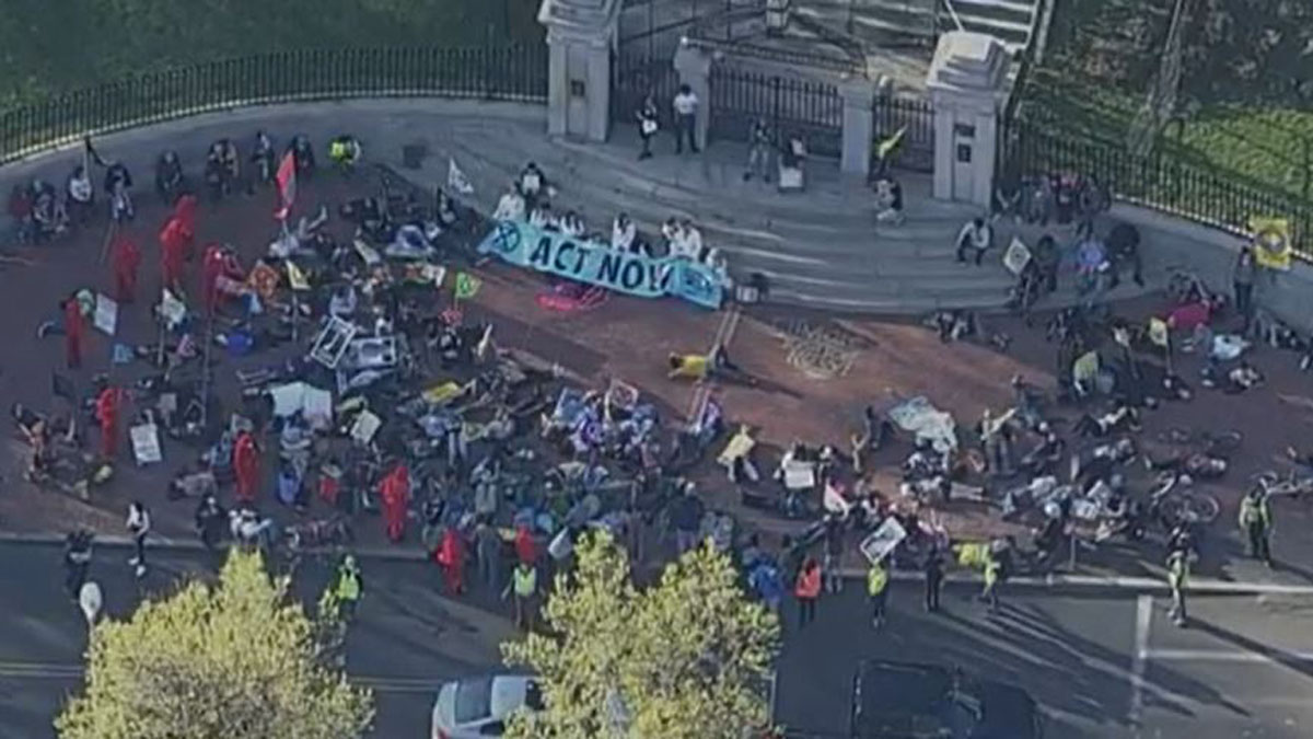 Climate activists march through streets of Boston on Earth Day Boston