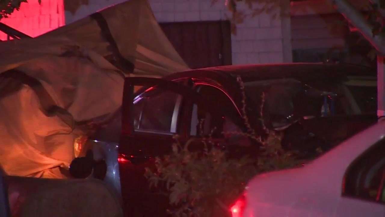 2 transported by ambulance after car drives into Boston building ...