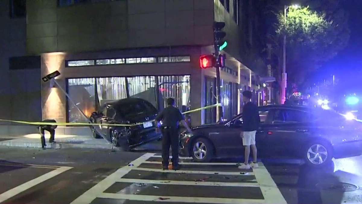 At least 1 person hospitalized after car crashes into building in ...