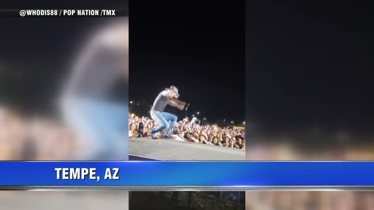 Tim McGraw takes an onstage tumble Boston News, Weather, Sports