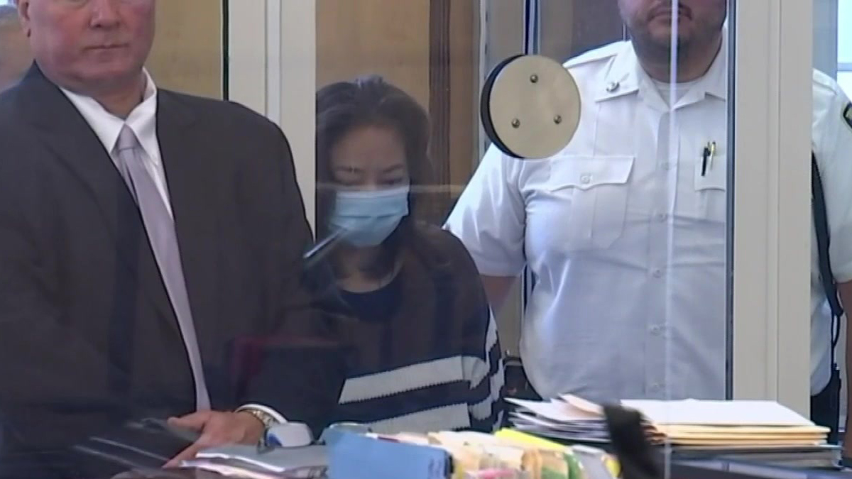 Newton woman arraigned on murder and theft charges in connection with