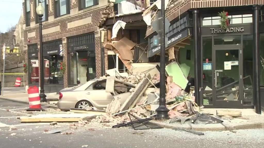 Cleanup underway after car crashes into busy building in Roslindale