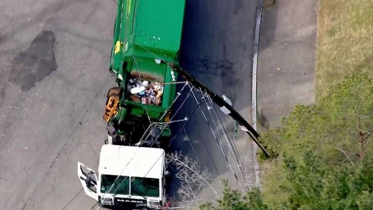 Garbage truck snags power lines in Newton - Boston News, Weather ...