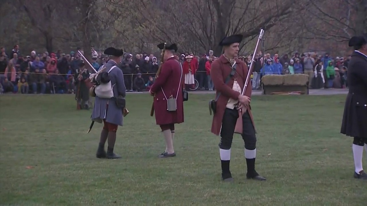 Crowd gathers for reenactment of the Battles of Lexington and Concord