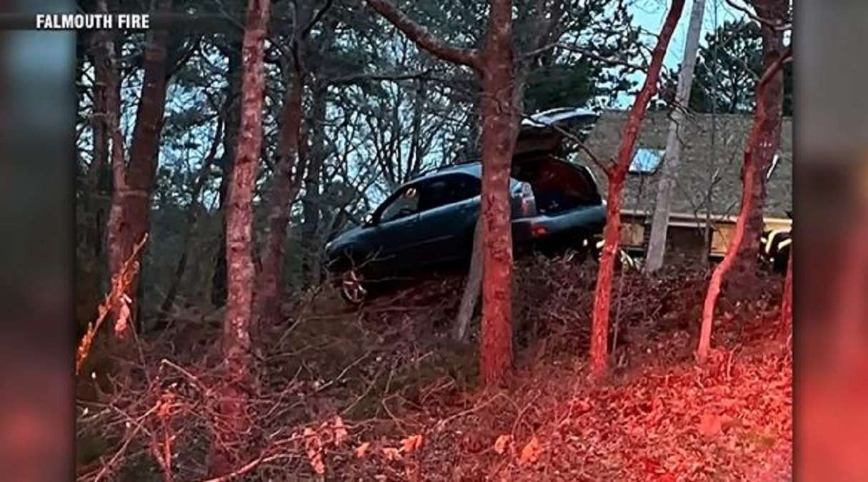 Driver rescued from car sliding down embankment in Falmouth - Boston ...