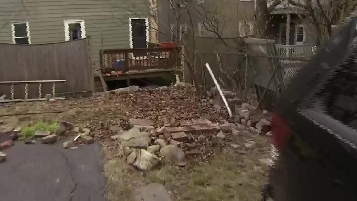 Car crashes through backyard in Somerville Boston News, Weather