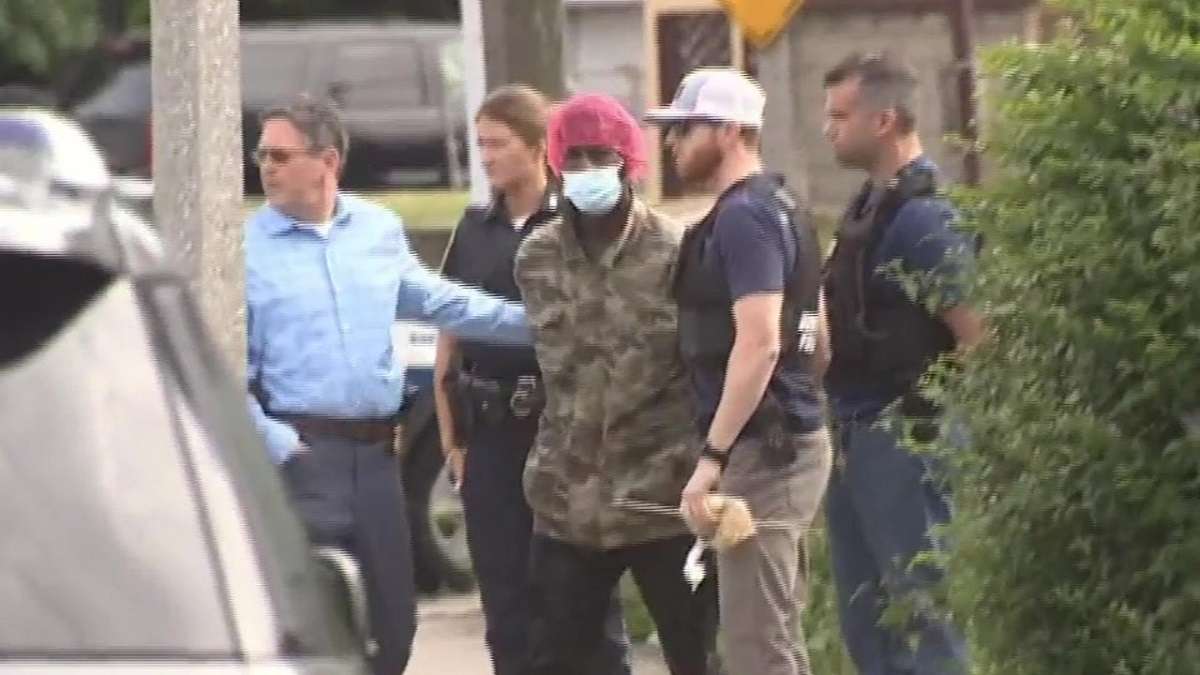 Man seen armed with rifle in Dorchester taken into custody by police ...