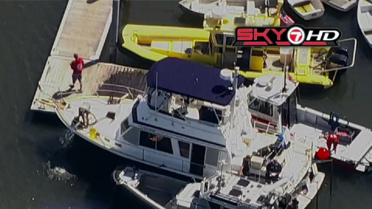 Boaters rescued after vessel hits rock, starts taking on water near ...