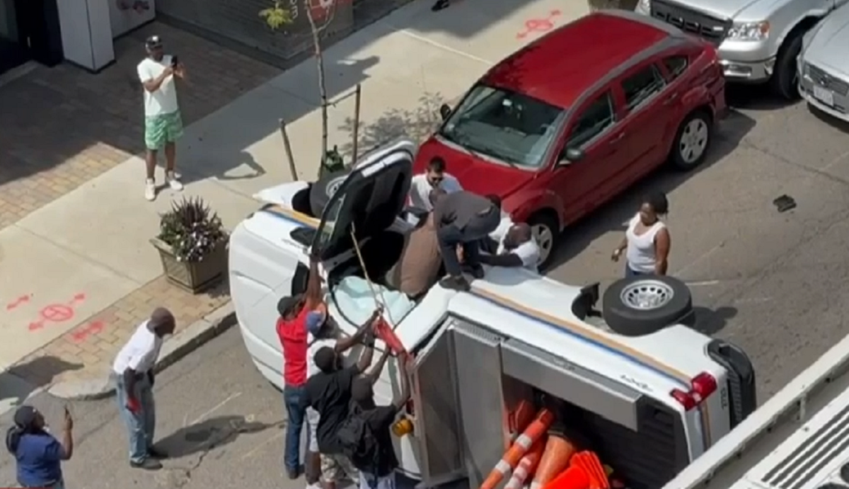Bystanders step in to help driver after rollover wreck involving MBTA ...