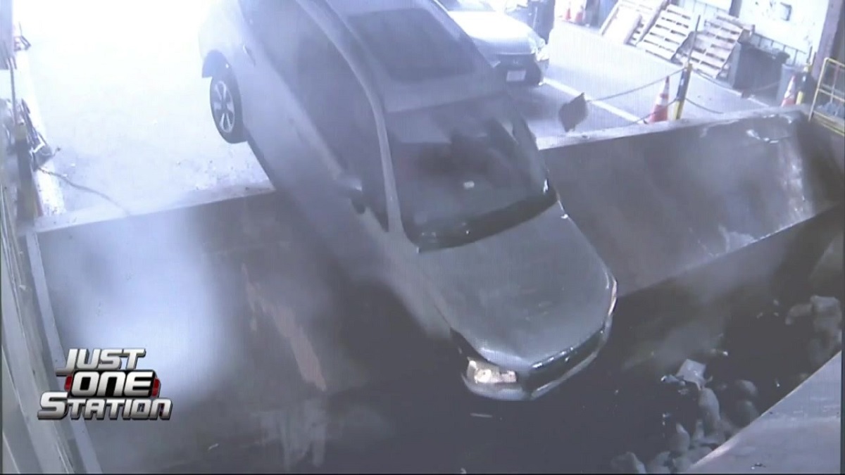 Surveillance video shows driver crash car into trash compactor in