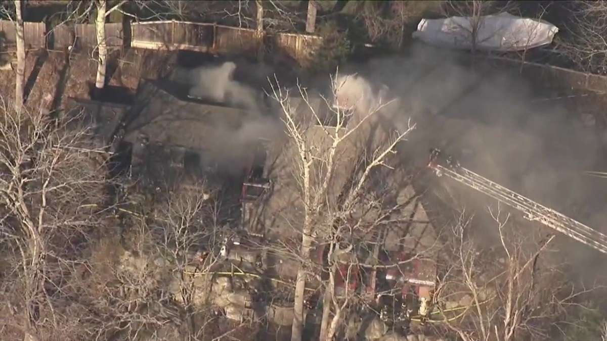 Firefighters battle 2-alarm fire in Gloucester home - Boston News ...