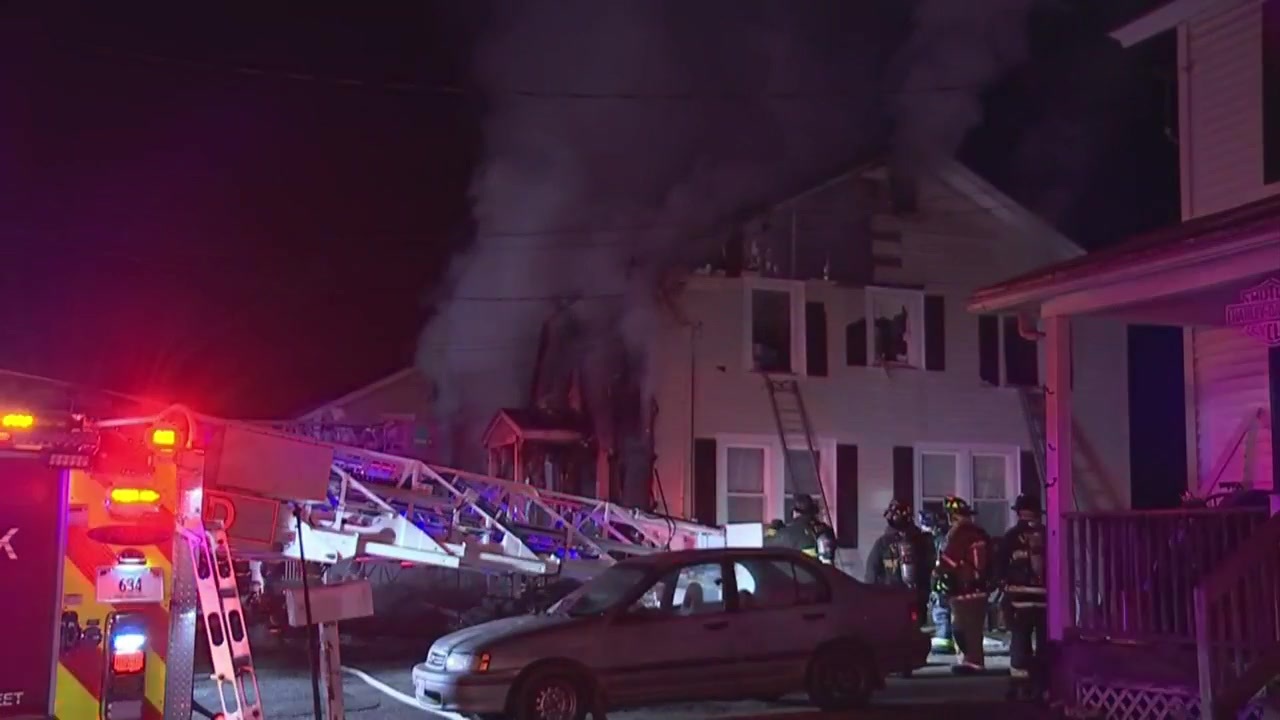 Four children killed as a fire tears through a multifamily home in