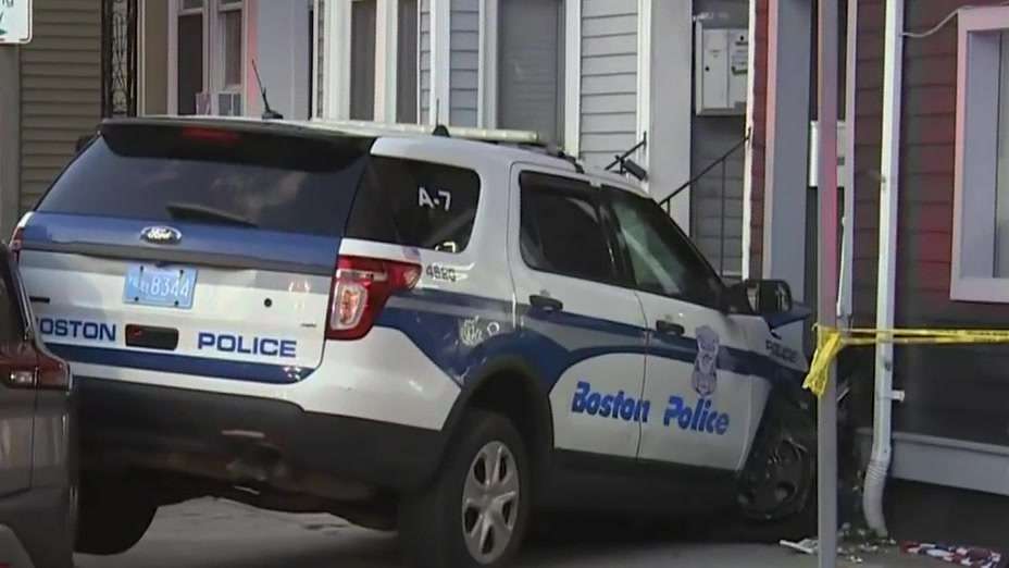 Police cruiser crashes into East Boston barber shop; officer ...