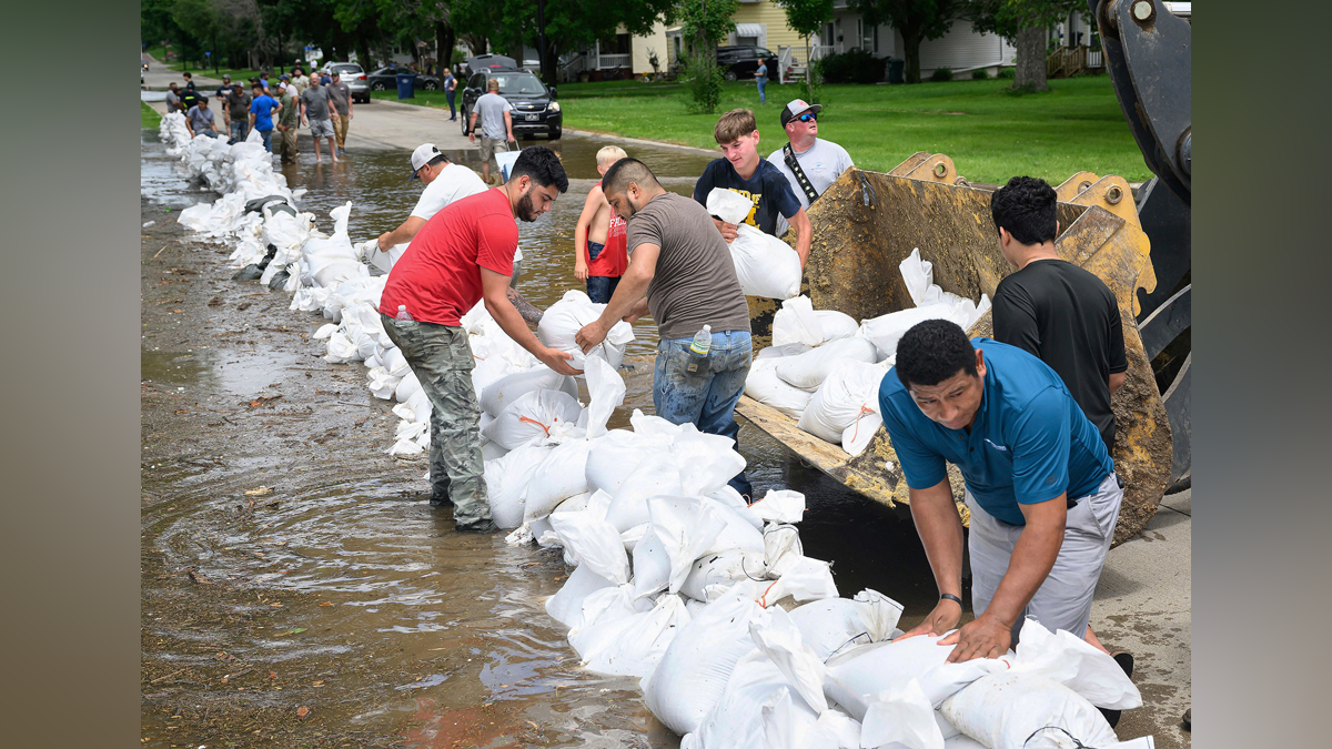‘Catastrophic flooding’ in Upper Midwest prompts evacuations as record ...