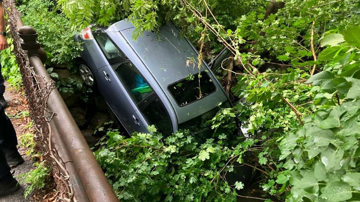 Police searching for driver who fled after car crashes into brook in ...