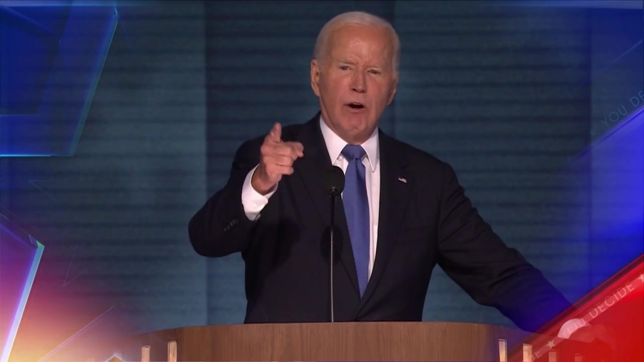 Biden gets a rousing ovation from Democrats as he gives Harris an